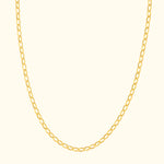Simple gold chain necklace with elongated links against a light background.