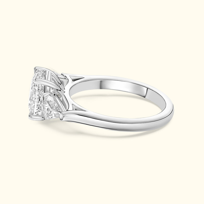 Elegant silver ring featuring a large, intricate diamond setting.