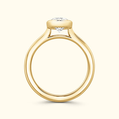 Elegant yellow gold engagement ring featuring a prominent diamond centerpiece.