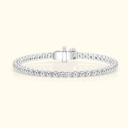 Elegant silver bracelet adorned with sparkling clear stones, featuring a secure clasp.