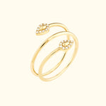 Gold open ring with two leaf motifs adorned with small diamonds.