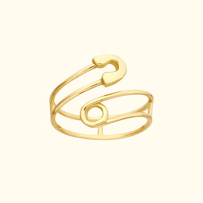 Gold wire cuff bracelet with a unique, modern design featuring flowing curves.