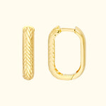 Gold hoop earrings with a braided texture and smooth finish.