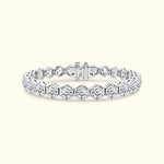 Silver hexagon-shaped bracelet with sparkling accents, showcasing a sleek design.
