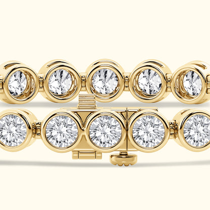 Gold bracelet featuring circular settings with sparkling clear diamonds.