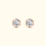 Hexagonal stud earrings featuring clear gemstones set in rose gold frames.
