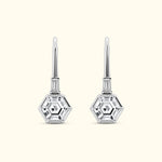 Silver hexagonal drop earrings with clear gemstones.