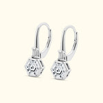 Elegant silver drop earrings featuring hexagonal clear gemstones.