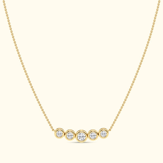 Gold necklace with five round diamonds set in circular settings.