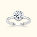 Hexagonal gemstone ring set in a sleek silver band.