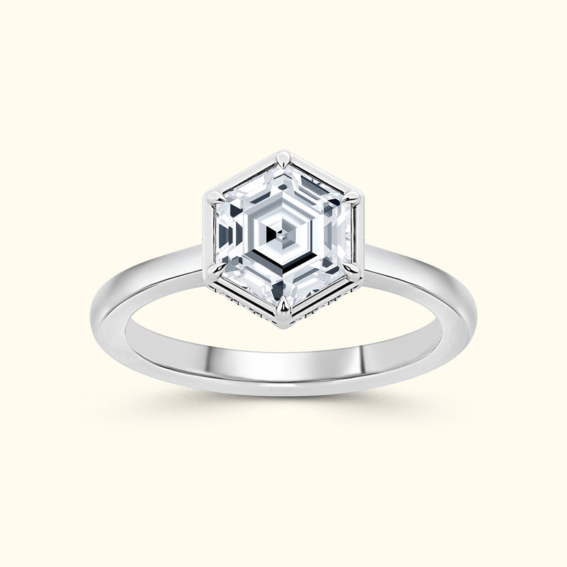 Hexagonal gemstone ring set in a sleek silver band.