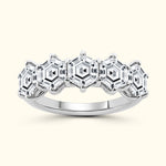 Stylish silver ring featuring five hexagonal diamond settings.