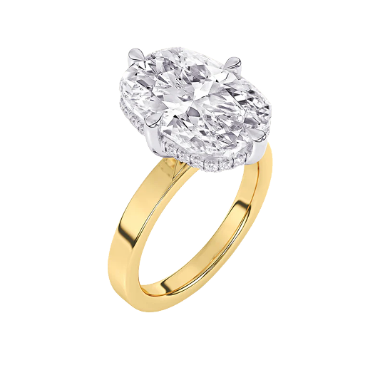 Oval diamond engagement ring in yellow gold